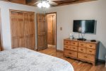 The king master suite has a tv, private access to the lakefront deck